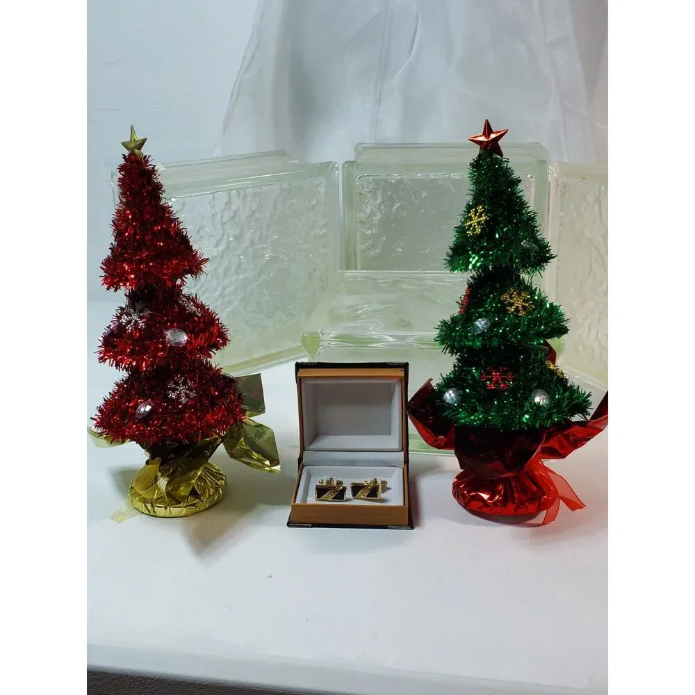 The Cufflinks are gold-toned with purple inlay Great Gift